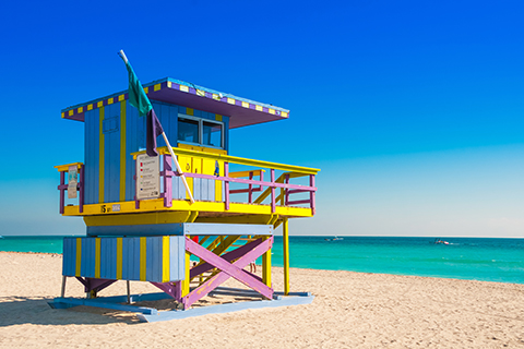 A stock photo of a lifeguard's tower on South Beach in Miami, Florida.